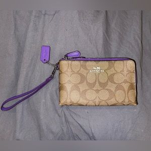 Double zippered coach wristlet!